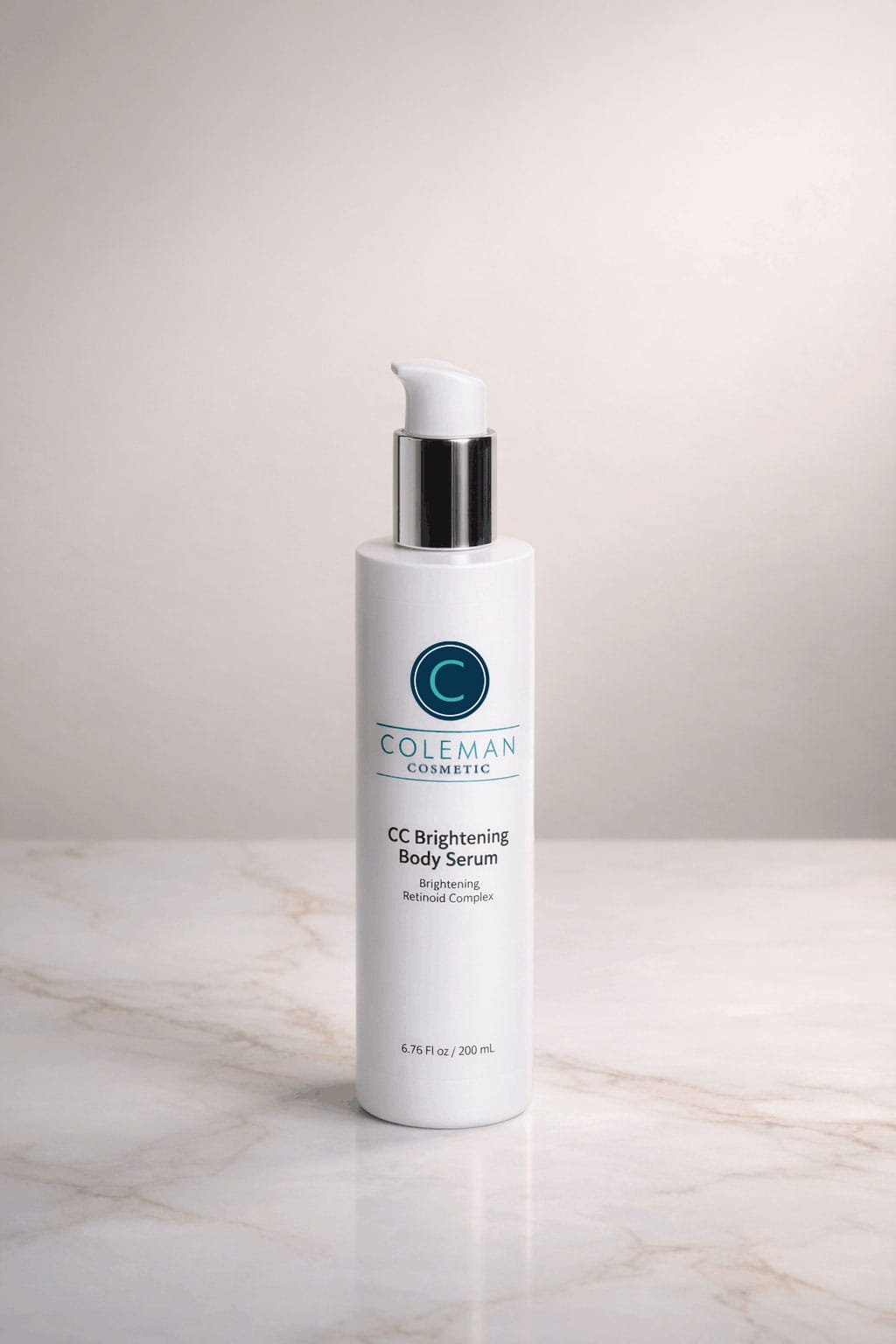 Coleman Cosmetics CC Brightening Body Serum bottle on a marble surface with a neutral background
